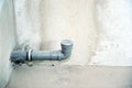 Installation of sewer pipes in a bathroom of an apartment interior during renovation works. Gray plastic drain pipe for used water Royalty Free Stock Photo