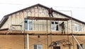 Installation of siding on the walls of the house