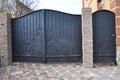 Installation of Stone and Metal Fence with Door and Gate