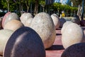 Installation of stony eggs in the park of Limassol on Cyprus. Sunny afternoon in springtime.