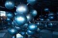 Installation of stylish connected silver balls decoration modern interior in science museum