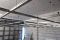 The installation of suspended ceiling at the construction site Royalty Free Stock Photo