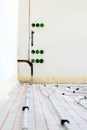 Installation of underfloor heating pipes for water heating. Heating systems. Pipes for underfloor heating Royalty Free Stock Photo