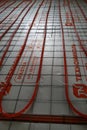 Installation of underfloor heating system, closeup on the water floor of the interior heating system of a new apartment building