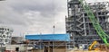 Installation using a concrete structure crane. View from below. The concept of construction of complex metal concrete structures