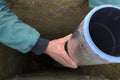 Installation of a ventilation pipe in the chimney, the pipe is wrapped with foil for cooling