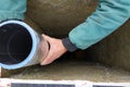 Installation of a ventilation pipe in the chimney, the pipe is wrapped with foil for cooling