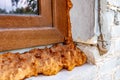 Installation of a window in a brick building using polyurethane foam.