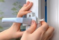 Installation of window restrictor to windows, using your hands,