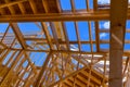 Installation of wooden beams at construction the assembled ceiling and wall on house Royalty Free Stock Photo