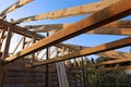 Installation of wooden beams at construction