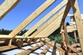 Installation of wooden beams at construction the roof truss syst Royalty Free Stock Photo