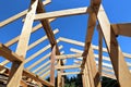 Installation of wooden beams at construction the roof truss syst Royalty Free Stock Photo