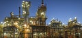 Installations of a modern refinery at night - panoramic view