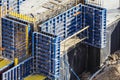 Installed formworks and iron rebars or reinforcing bar for reinforced concrete partitions at the construction site of a large