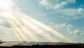 Installed row of photovoltaic solar power plant under clear cloudy sky in sunny day Royalty Free Stock Photo