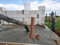 Installed sewer, pour concrete for screed in the house