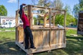 Installers build a pavilion of wood material