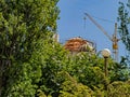 The Installers Revet with A Golden Patina the Dome of the Orthodox Church Under Construction Royalty Free Stock Photo