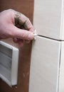 Installing bathroom tile Royalty Free Stock Photo