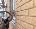 Installing brick siding on the wall of the house Royalty Free Stock Photo