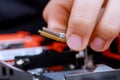 Installing computer hardware technician install CPU on motherboard Royalty Free Stock Photo