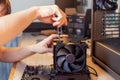 Installing a cooler on a personal computer processor. Royalty Free Stock Photo