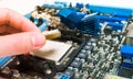 Installing the CPU into the motherboard Royalty Free Stock Photo