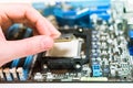 Installing the CPU into the motherboard Royalty Free Stock Photo