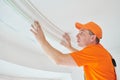 Installing decorative ceiling molding. home repair and decoration