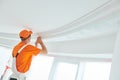 Installing decorative ceiling molding. home repair and decoration