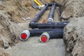 Installing district heating pipes in a trench