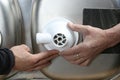 Installing the drain for a kitchen sink Royalty Free Stock Photo