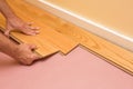 Installing Engeneered Hardwood Floor.