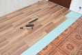 Installing laminate flooring. Laminate flooring installation int Royalty Free Stock Photo