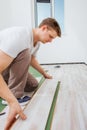 Installing laminate flooring Royalty Free Stock Photo