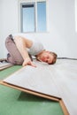 Installing laminate flooring Royalty Free Stock Photo