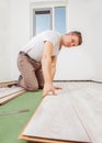 Installing laminate flooring Royalty Free Stock Photo