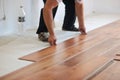 Installing laminate flooring Royalty Free Stock Photo