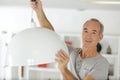 Installing lamp at home Royalty Free Stock Photo