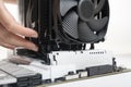 Installing a large cooler on a computer processor. Royalty Free Stock Photo