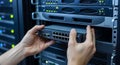 installing network switch in server rack cabinet Royalty Free Stock Photo