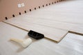 Installing new laminate wood flooring in the house Royalty Free Stock Photo