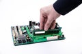 Installing a new RAM DDR memory for a personal computer processor socket in a service. Upgrade repair. PC upgrade or repair Royalty Free Stock Photo