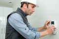 Installing programmable room thermostat