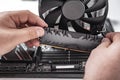 Installing random access memory into PC.