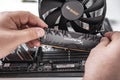 Installing random access memory into PC.