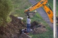 Installing the rings with a tractor bucket