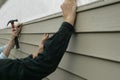 Installing Siding on a House Royalty Free Stock Photo