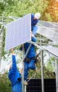 Installing of solar photo voltaic panel system Royalty Free Stock Photo